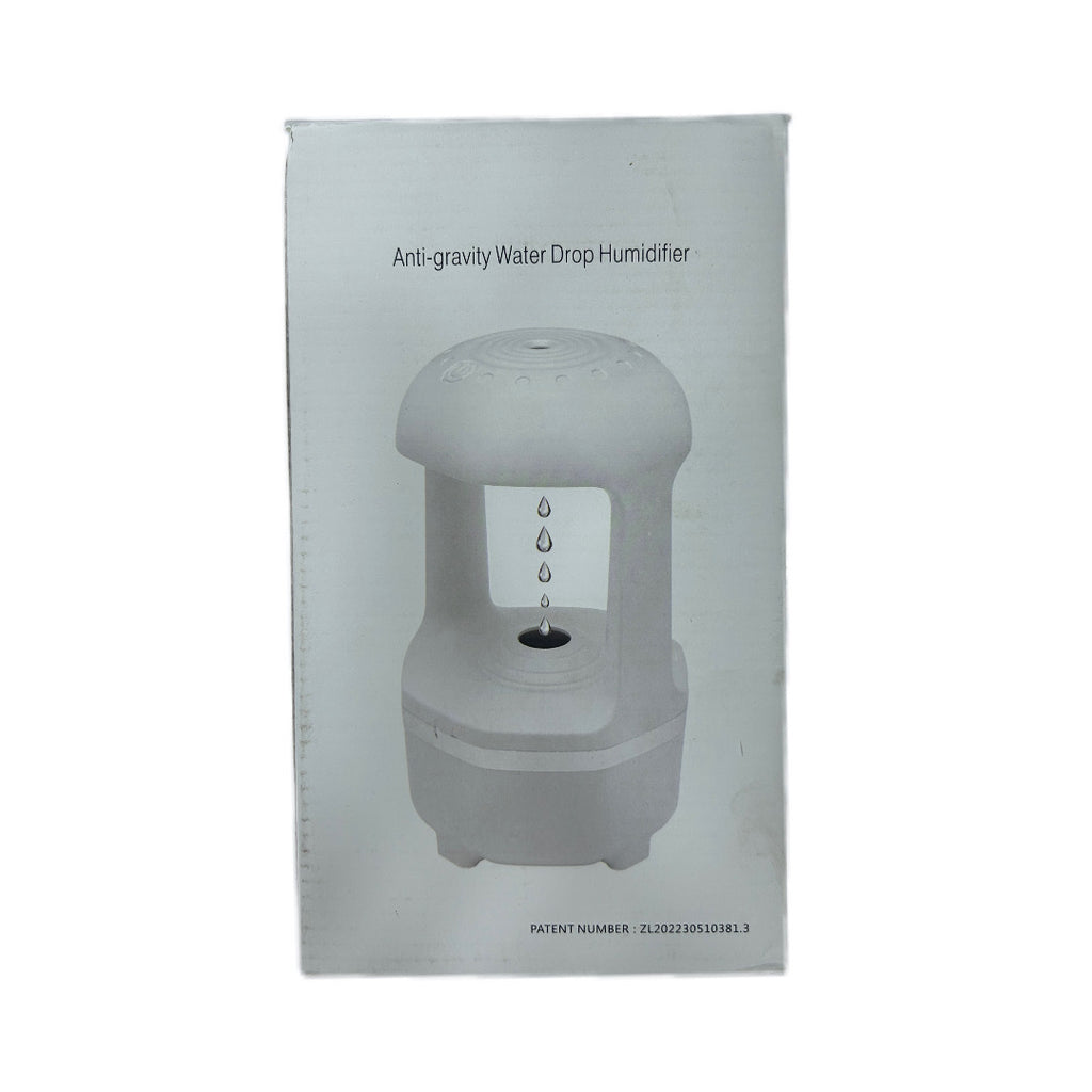 Box packaging of an anti-gravity water drop humidifier with product image and text on a white background.
